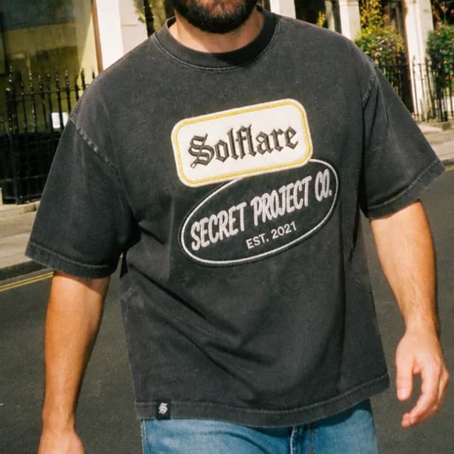 Solflare Secret Project tee produced by Nomu